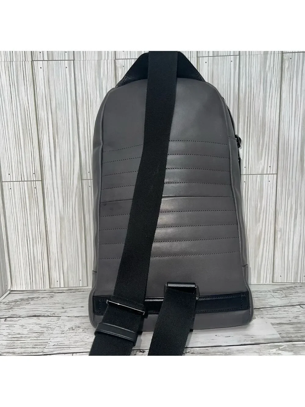 TUMI Gray Leather Sling Backpack Crossbody Bag Travel Everyday Work